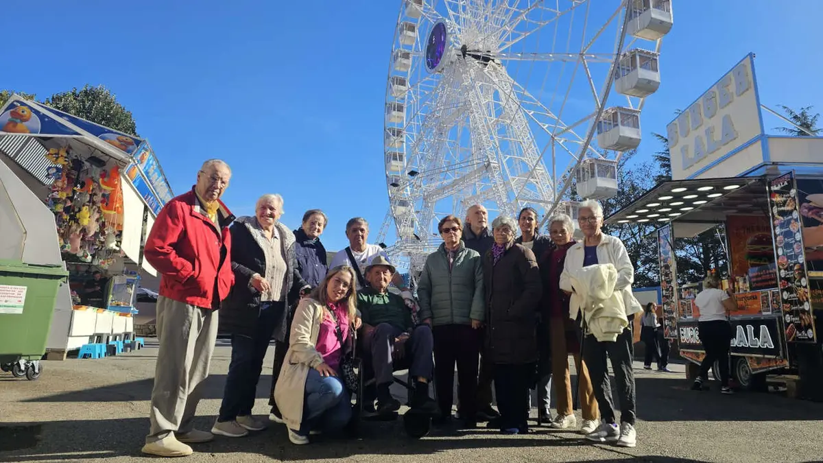 Una visita al recinto ferial acerca el San Froilán a usuarios de Albertia Lugo
